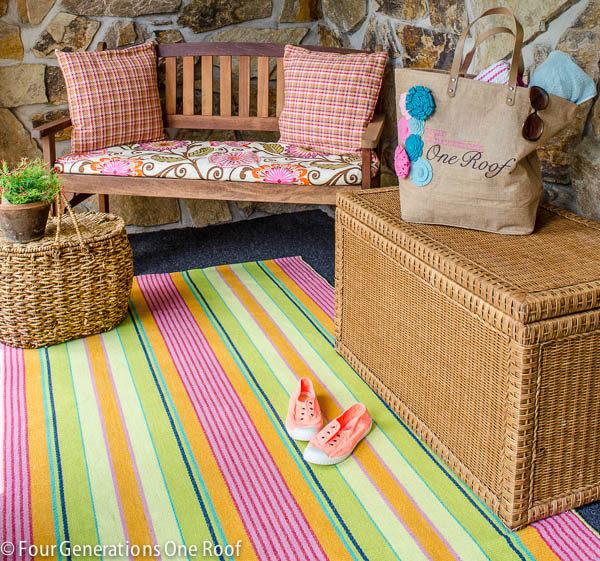 https://www.ohmeohmyblog.com/wp-content/uploads/2014/04/foyer-summer-upate-with-pink-striped-rug-3.jpg