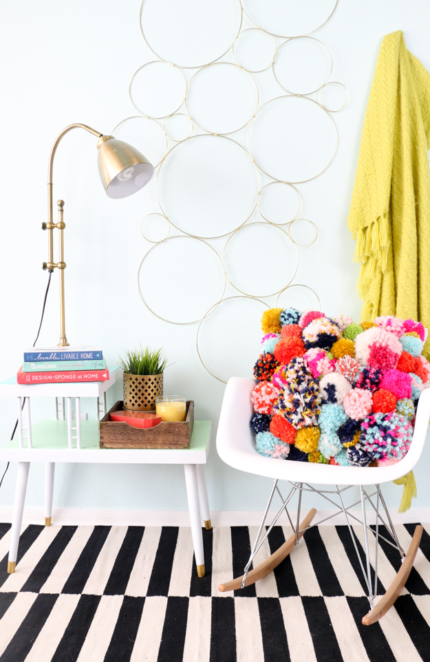 How to DIY Pompom Rugs to snuggle by the fireplace